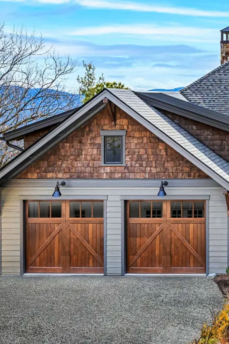 Modern Farmhouse with a Rustic Wooden Garage Door