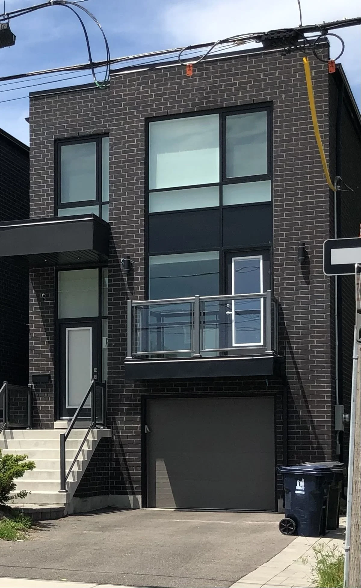 Urban Townhouse with Integrated Garage Storage