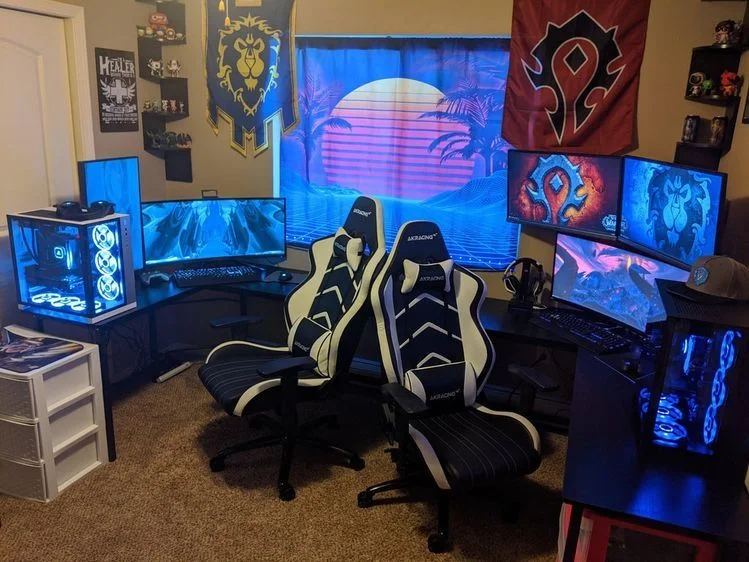 Futuristic Neon Dual Gaming Setup with Figurines