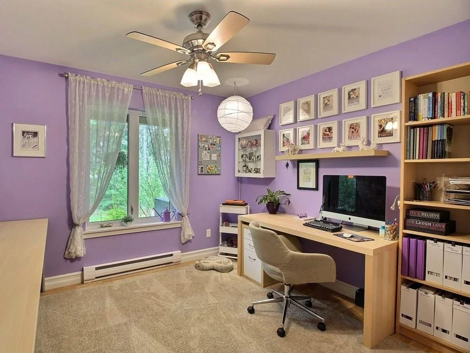 Luxurious Purple Home Office with Built-in Shelves