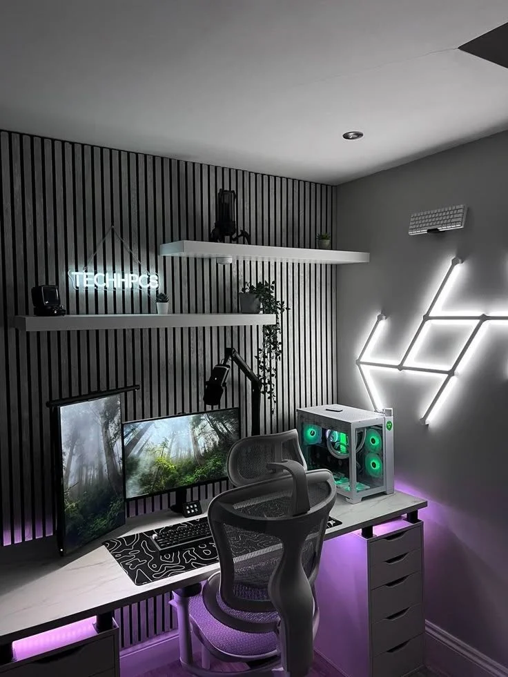 Modern Gray Gaming Desk Setup with Neon Sign