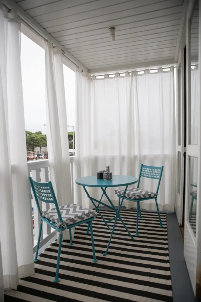 17. Cozy Balcony Seating Area