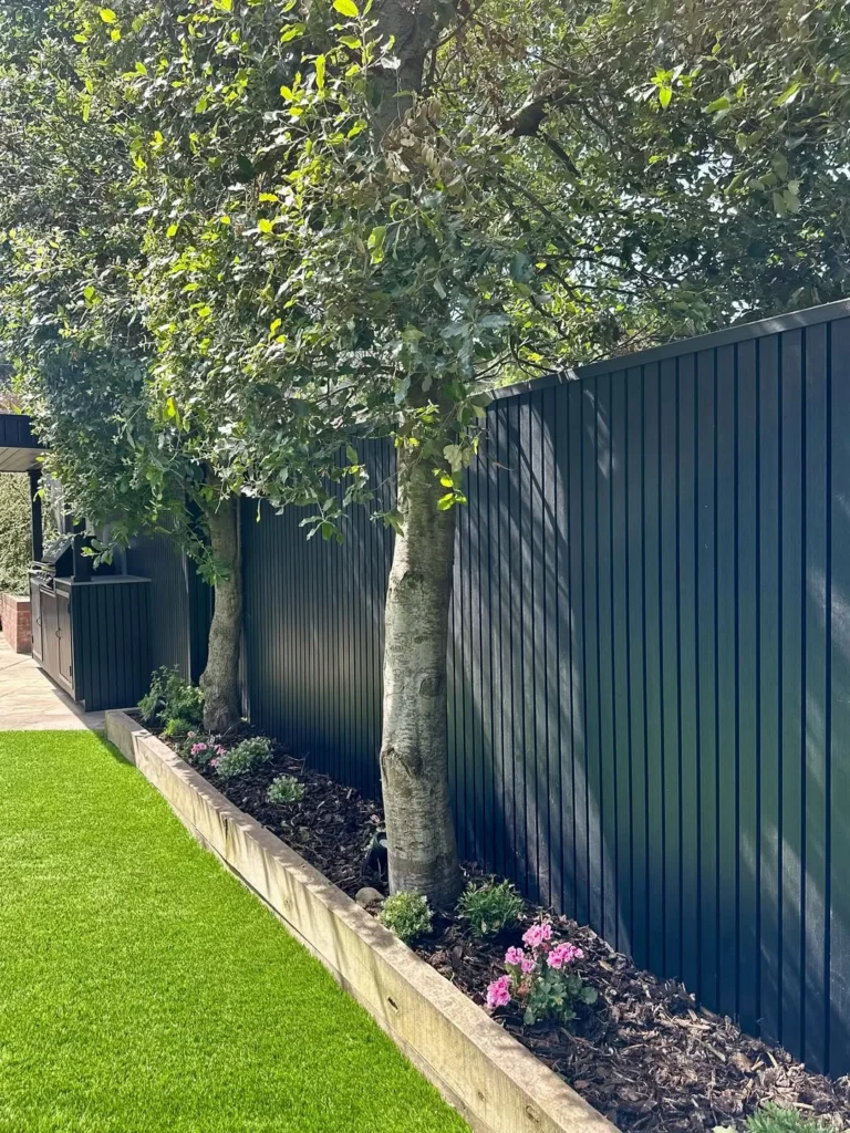 Sleek Gray Fence with Planters