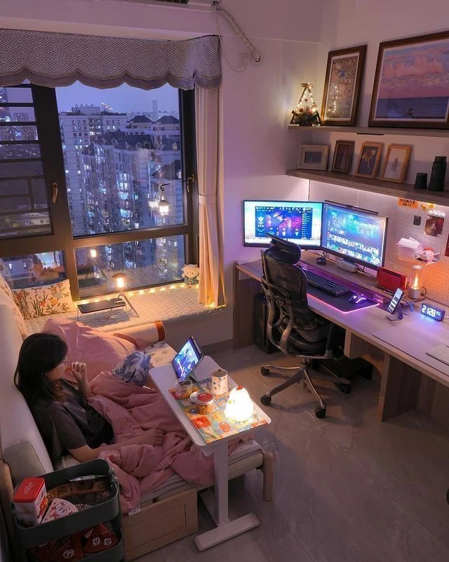 Cozy Urban Bedroom Gaming Setup with City View