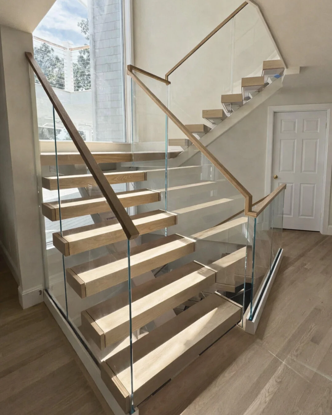 15 Staircase Railing Design Ideas for Stylish Homes 45 Mixed Wood & Glass Railing