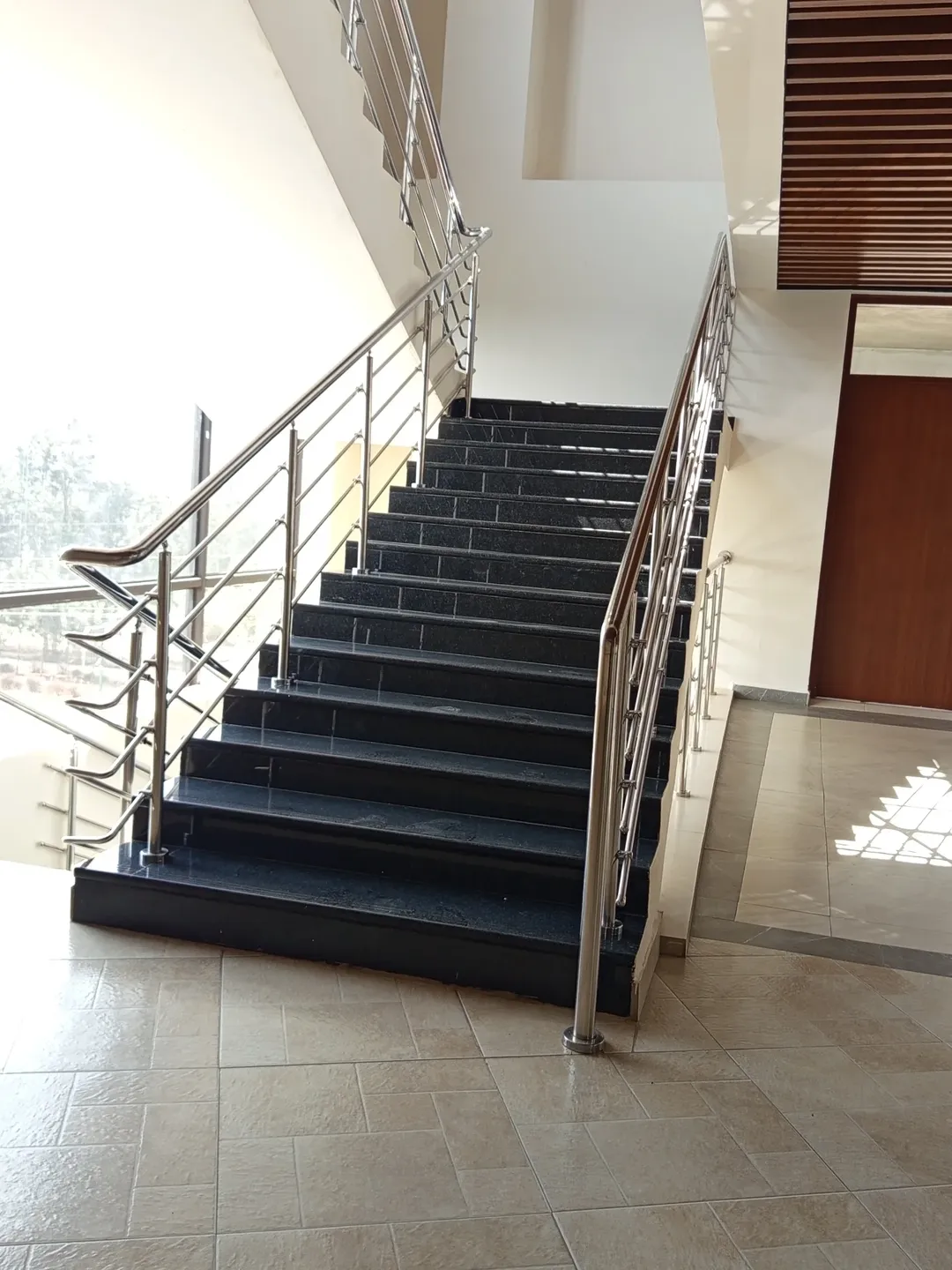 15 Staircase Railing Design Ideas for Stylish Homes 23 Industrial Pipe Railing