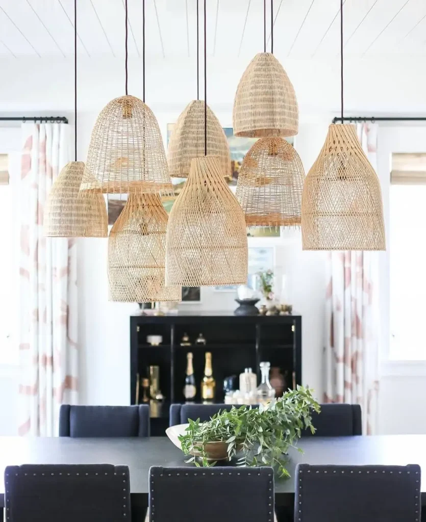 This pendant light arrangement features a stunning cluster of staggered rattan shades perfectly