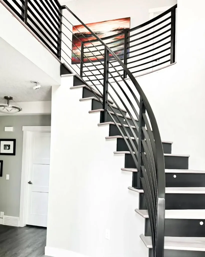 Curved Staircase with Metal Railing